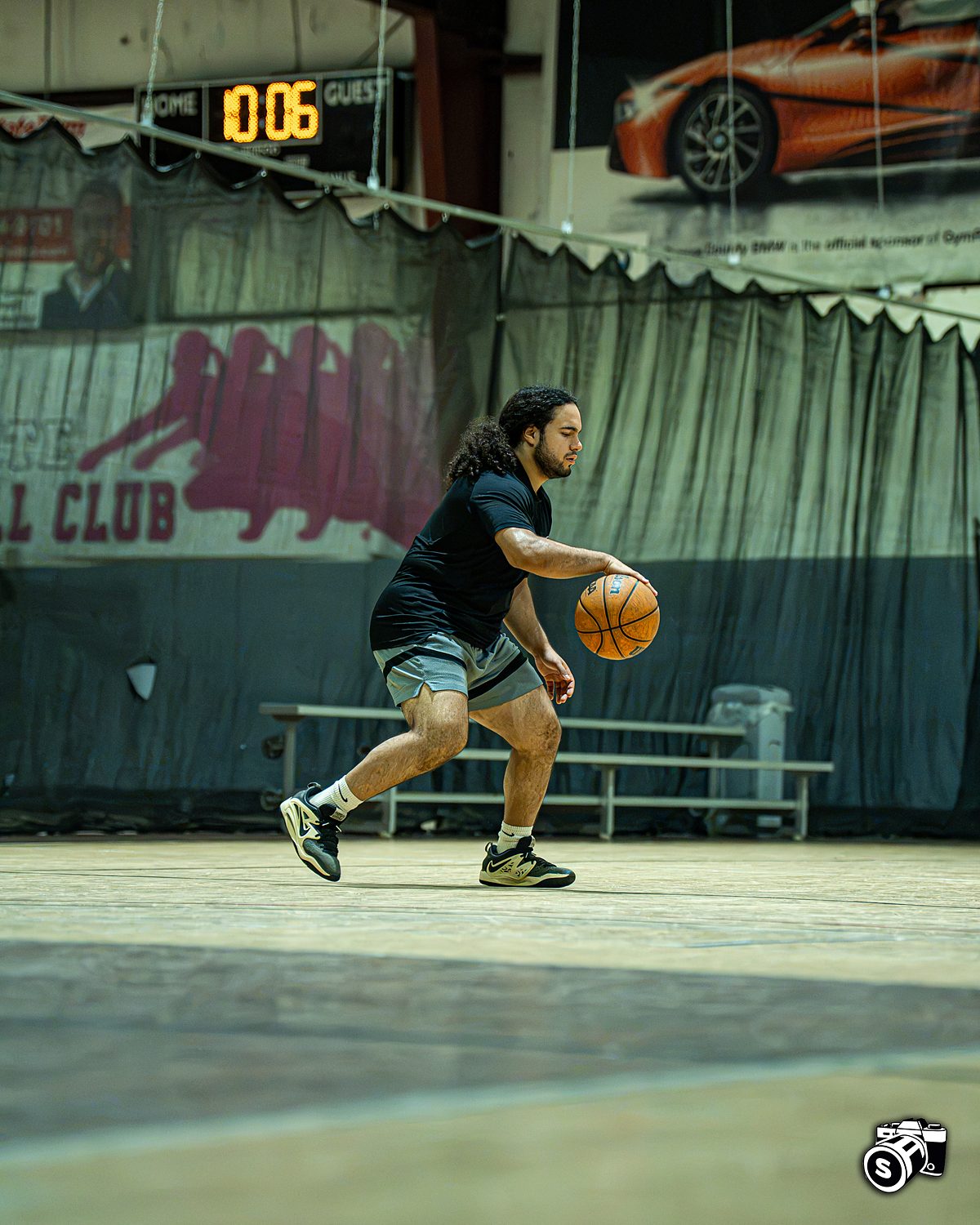 Coach working through a ball-handling rep