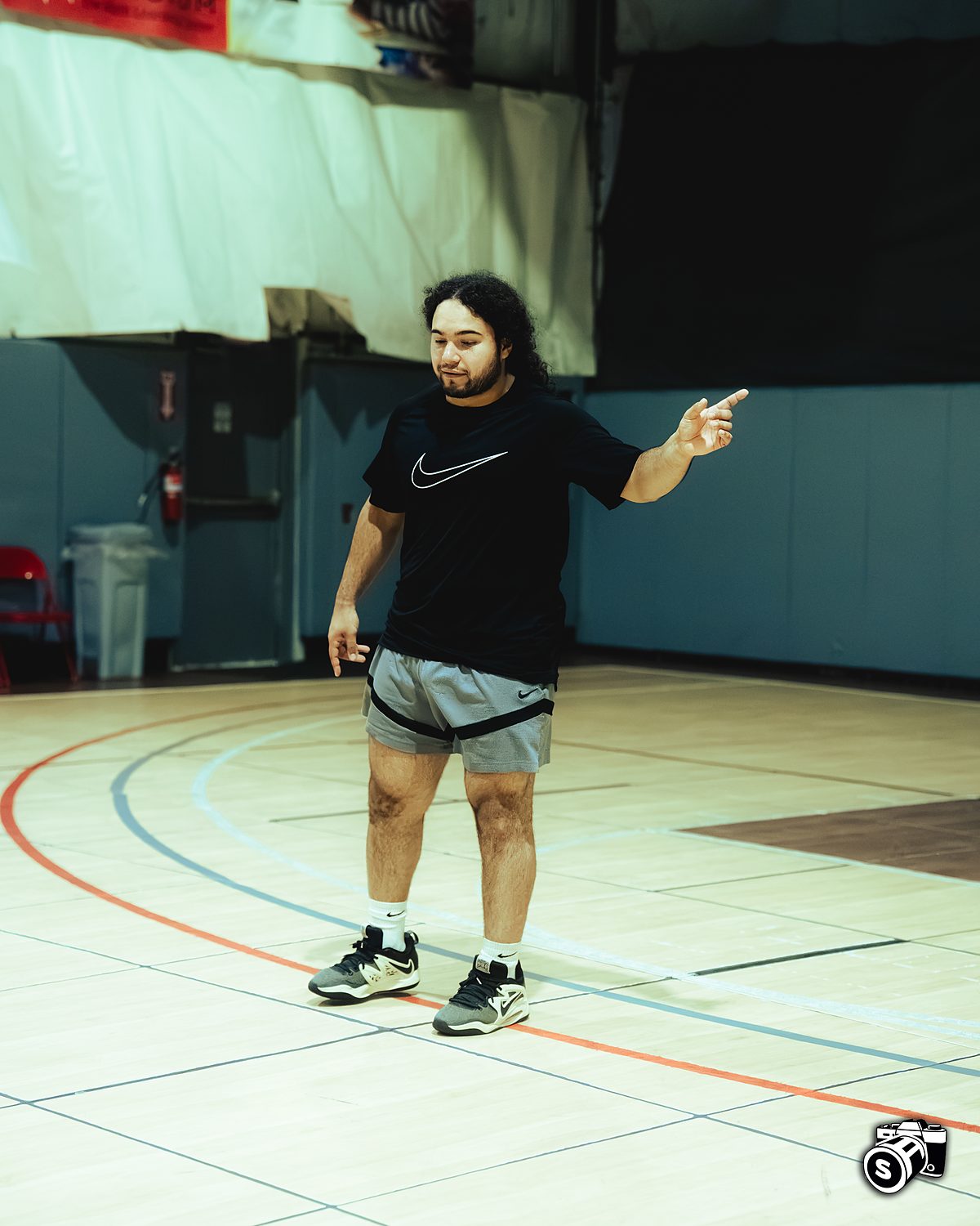 Coach directing a rep from the court